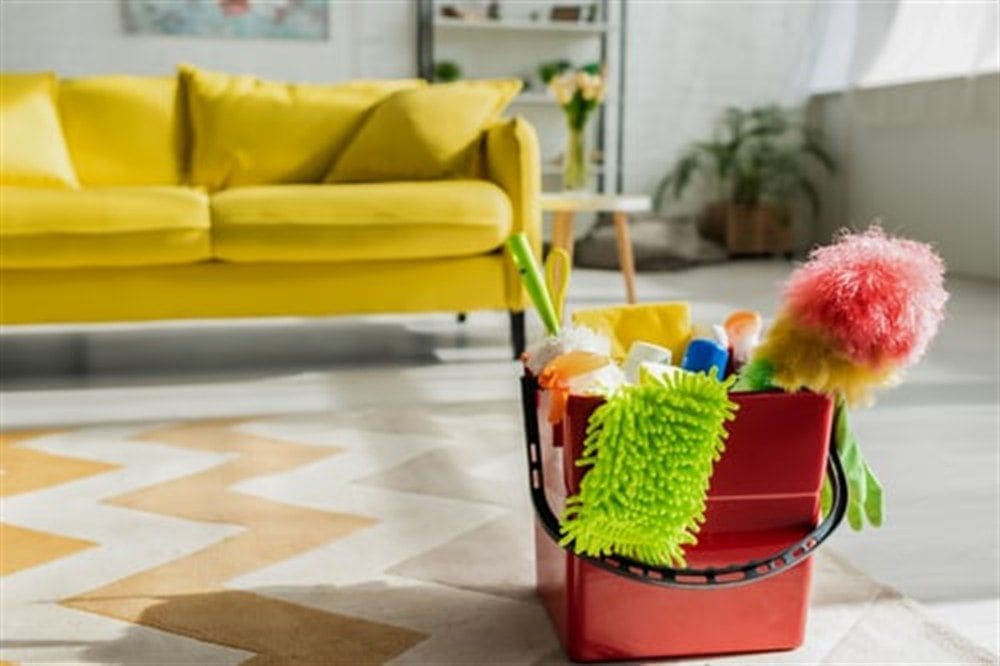Cleaning supplies laid out for a professional house cleaning in Virginia