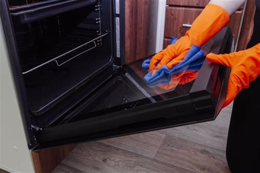 Detailed deep cleaning of a kitchen surface by Strong Hands Cleaning in Woodbridge VA