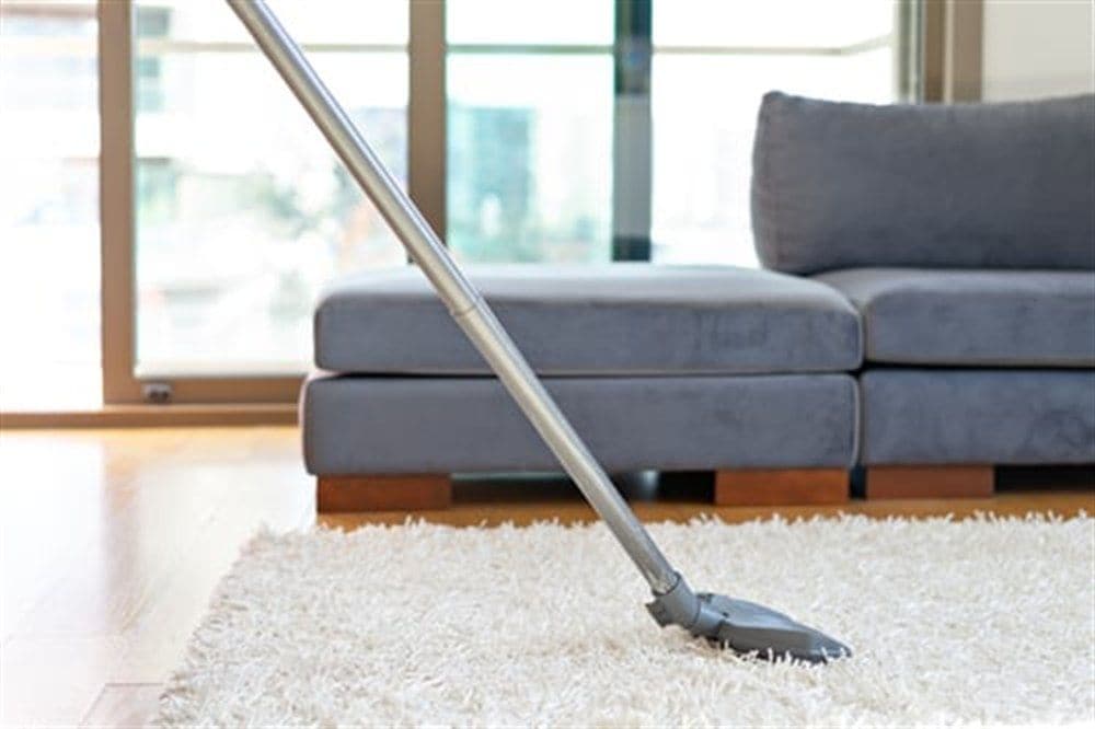 Strong Hands Cleaning professional cleaning a bright home interior in the DMV